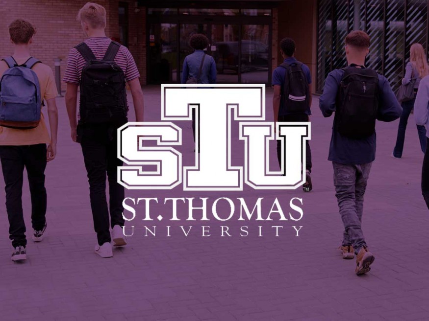 St. Thomas University logo with purple background
