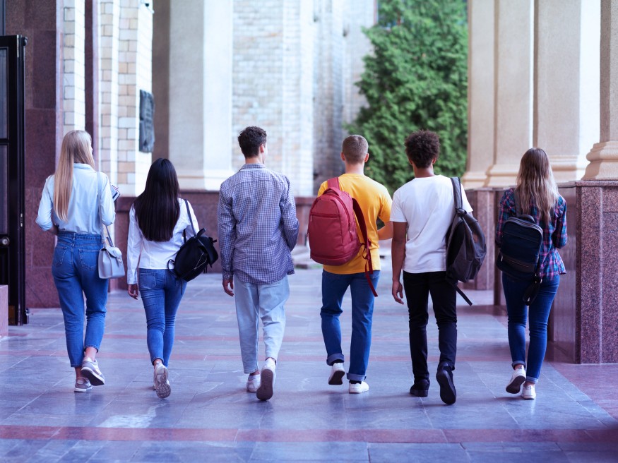 Students walking on university campus